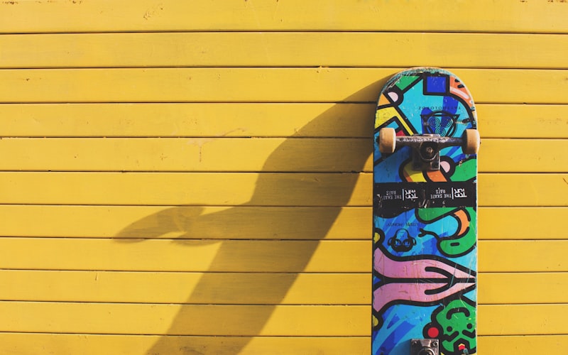 Skateboard resting against a wall, representing the SK8.RUN community