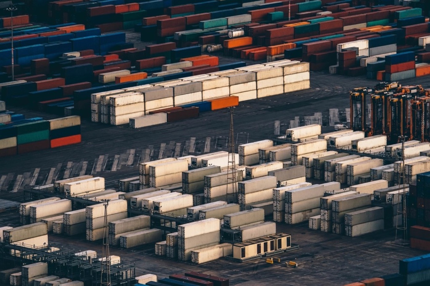 Aerial view of stacked shipping containers at a port